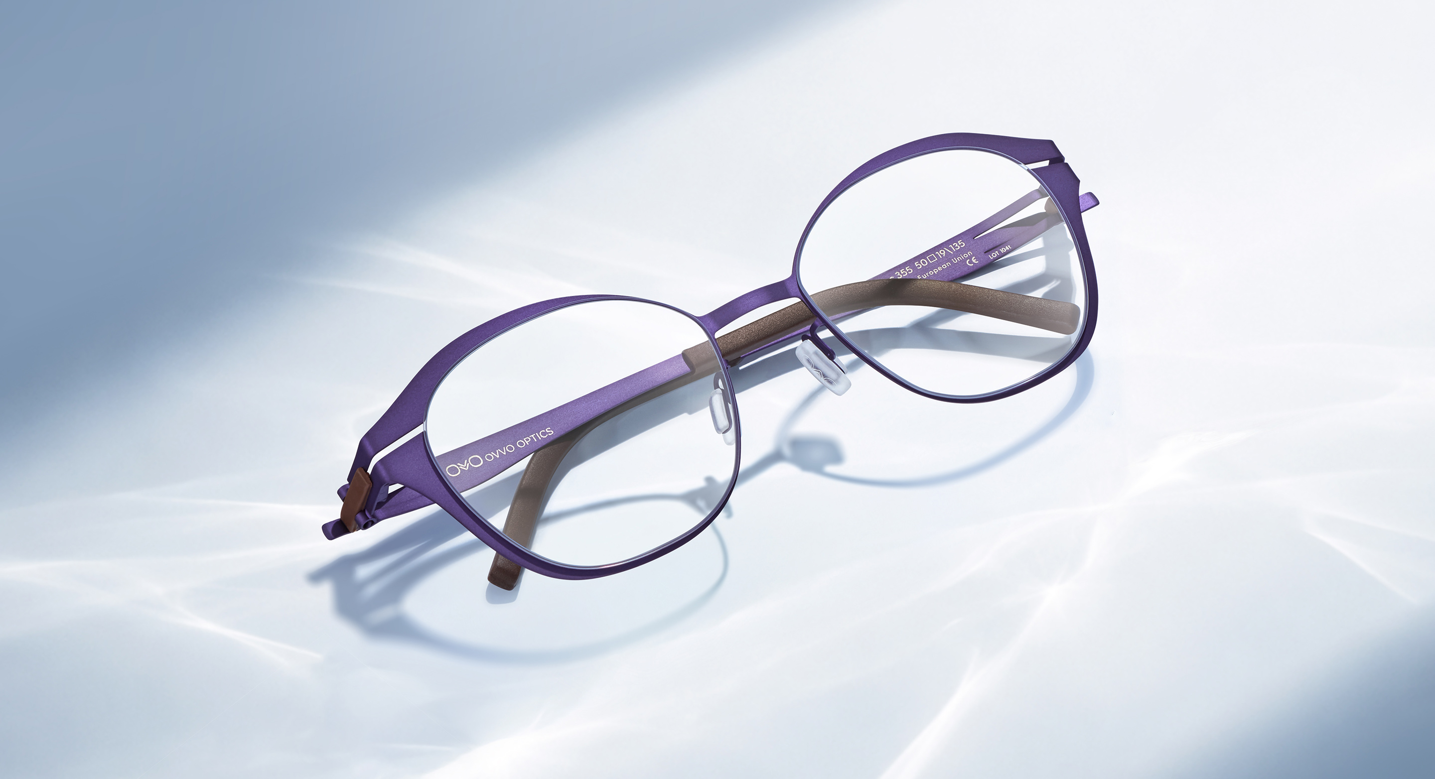 OVVO Optics purple geometric optical eyeglasses in a studio cover shot on a light background