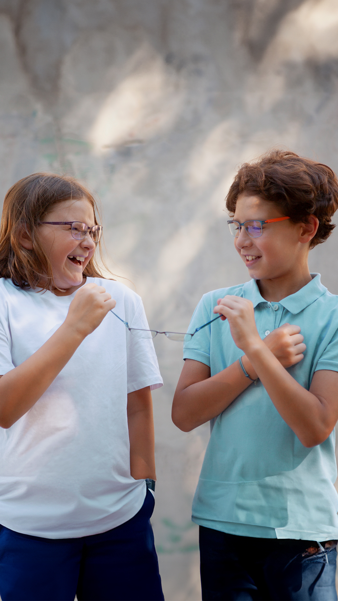 Active kids wearing OVVO Optics Junior glasses designed for sports, school, and outdoor fun.