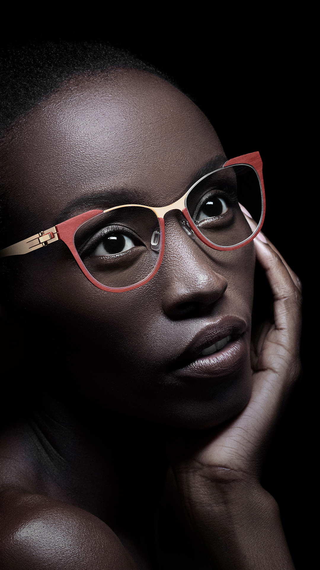 Mobile view of OVVO Optics Wood & Carbon Fiber frames, showcasing natural textures.